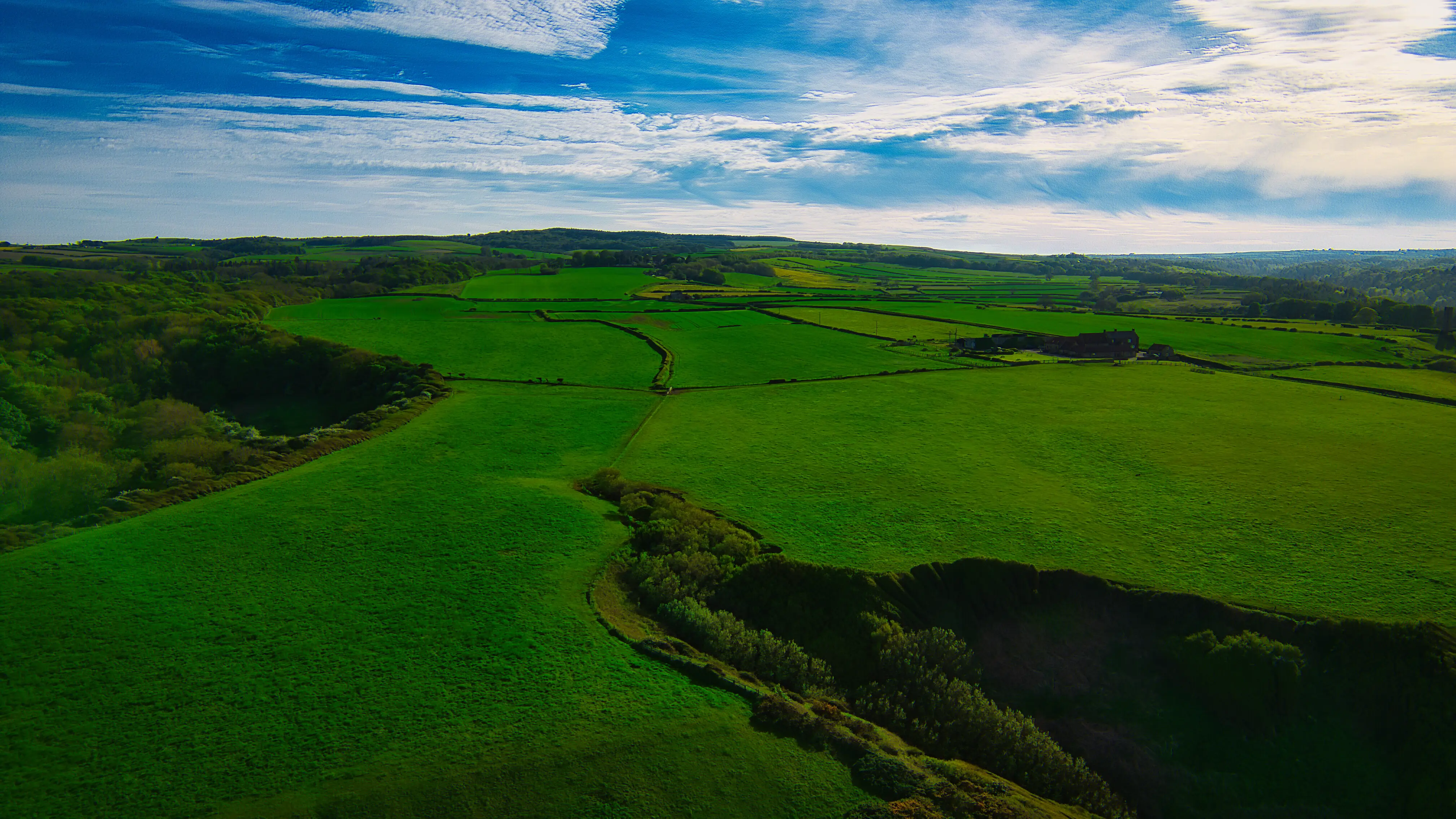 Overhead view of green fields and hills in Sandsend, Yorkshire.
